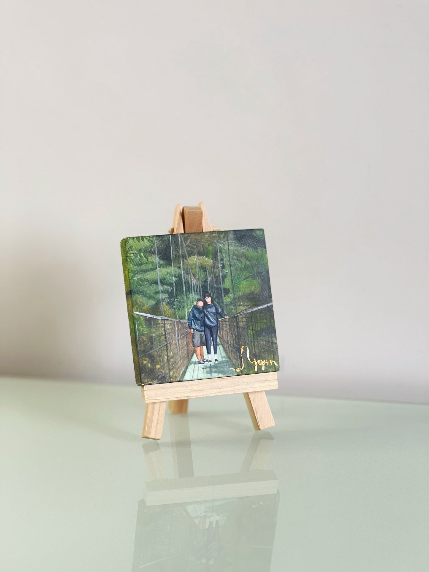 Retrato en mini lienzo (7x7 cm) con caballete